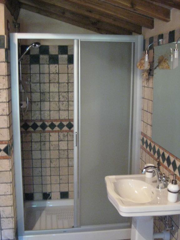 Отель La Casa Di Ercole Беванья Экстерьер фото