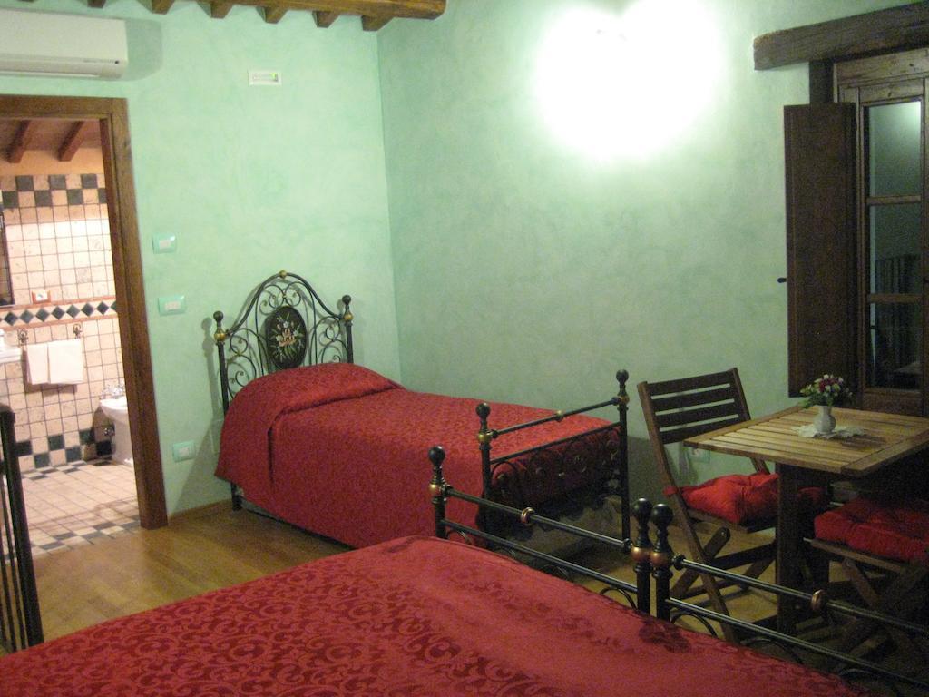 Отель La Casa Di Ercole Беванья Экстерьер фото